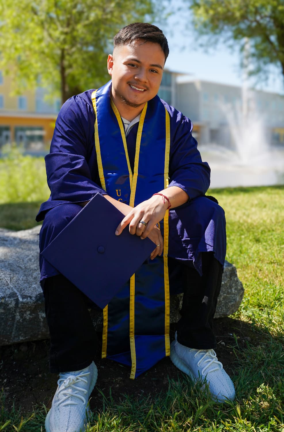 Image of Henry Rodas in university graduation clothing